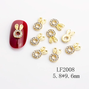 Detailed view of hollow bunny nail charms with rhinestones measuring 5.8x9.6mm