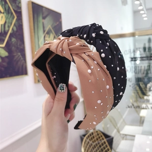 Elegant wide knotted headband for women with faux pearls and rhinestones decoration