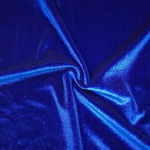 Detail of royal blue velvet fabric with rich texture and subtle shimmering reflections