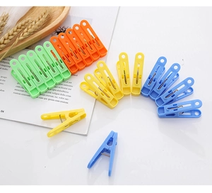 Close-up of colorful heavy duty plastic clothespins with strong springs for drying clothes