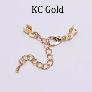 Detail of KC Gold extender chain set with lobster clasp and ribbon crimp ends