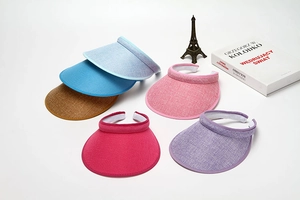 Selection of colorful breathable straw sun visors for summer beach and outdoor use