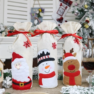 3-pack Christmas wine bottle covers with Santa, Snowman, and Reindeer designs