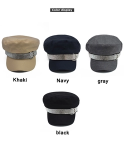 Color display of four vintage baker boy caps with sparkling rhinestone embellished bands