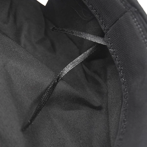Close-up of internal black lining and adjustable straps on this stylish beret hat