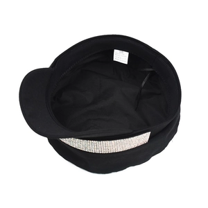 Black baker boy hat with silver rhinestone trim, featuring inner lining and 58cm size label