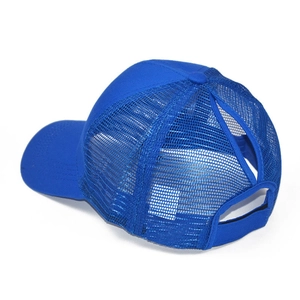 Detail view of bright blue ponytail baseball cap featuring breathable mesh back and opening