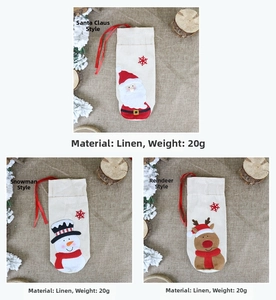 Detail of burlap Christmas wine bottle bags featuring Santa, Snowman and Reindeer designs