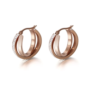 Elegant rose gold triple hoop earrings with micro-paved cubic zirconia on white background