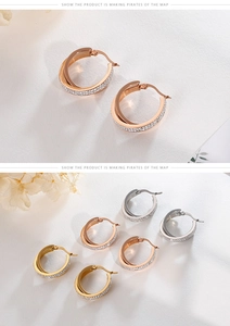 Detailed view of rhinestone inlaid hoop earrings in gold, rose gold, and silver finishes