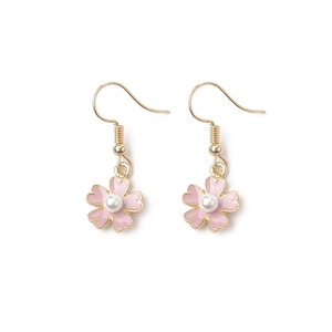 Pink cherry blossom drop earrings with gold trim and central pearl on white background