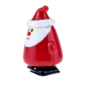Detail of red plastic wind-up Santa Claus toy showing the clockwork base and white beard