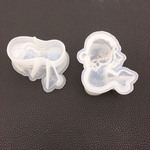 Macro view of flexible mermaid shaped silicone mold for DIY resin pendant crafting