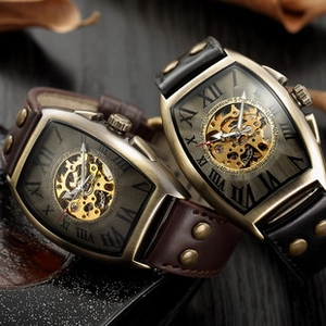 Detailed macro view of vintage bronze tonneau skeleton automatic mechanical watch gears