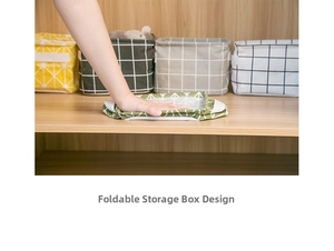 Detailed view of foldable cotton linen storage baskets with various geometric patterns