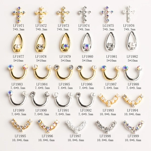 Variety of metallic nail art charms in gold and silver with rhinestones and pearls