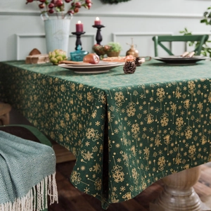 Deep green Christmas tablecloth with gold festive patterns on premium cotton linen fabric