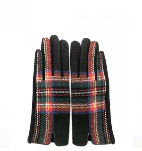 Detail of wool-like winter gloves featuring classic Scottish tartan pattern and thick lining
