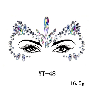 Detailed view of YT-48 iridescent acrylic face gem stickers for festival makeup