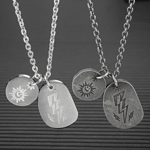 Retro hip-hop steel necklace featuring sun smiley face and lightning bolt pendants