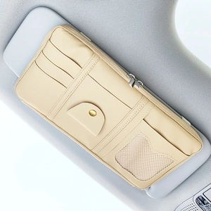 Detail of beige PU leather car sun visor organizer with card slots and zipper pouch