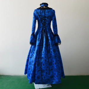 Detail of the royal blue Victorian gown featuring black lace cuffs and back corset lacing
