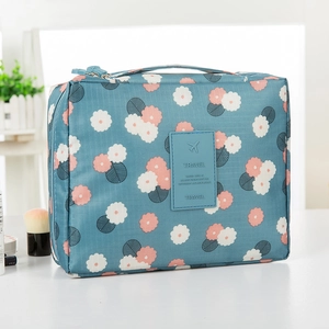 Blue floral waterproof travel toiletry bag with large capacity and portable handle