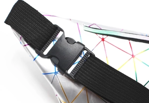 Macro detail of high-strength plastic buckle and nylon strap on laser geometric waist bag