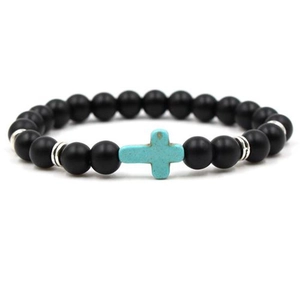 Men's matte black beaded bracelet featuring a turquoise stone cross with silver spacers
