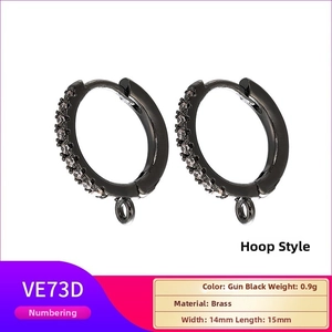 Macro view of gun black brass earring hoops with zircons and 14mm by 15mm dimensions