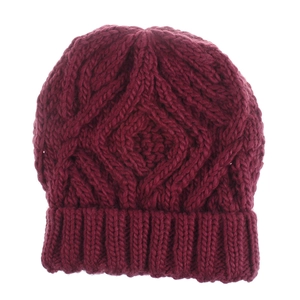 Close-up of diamond lattice knit pattern on wine red thick yarn winter beanie cap
