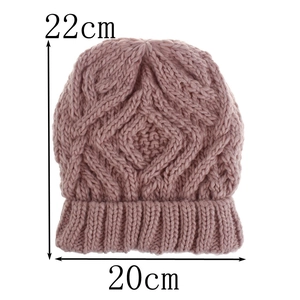 Detail view of pink knit beanie with diamond pattern showing dimensions 22cm by 20cm