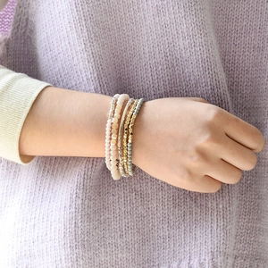 Multi-layer stretch bracelet with Miyuki crystal beads and gold copper curved tubes