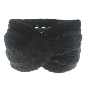 Detail view of black chunky knit winter headband with twist design for women