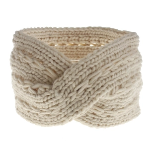 Detail of creamy white cable knit headband showing thick cross-knot texture and soft fabric