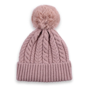 Winter chunky knit beanie in dusty pink featuring a faux fur pompom and ribbed cuff
