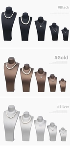 Close-up of three necklace display busts in black, gold, and silver brushed leather finishes
