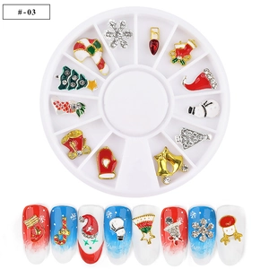 Christmas nail art charms kit with 12 alloy shapes in a white storage wheel