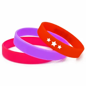 Custom eco-friendly silicone wristband set in red, purple, and pink with printed logos