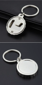 Detail of silver metal bottle opener keychain with smooth surface for custom engraving