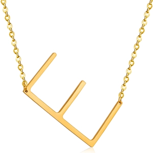 Detail of a minimalist gold-plated 18K stainless steel necklace featuring a capital E pendant