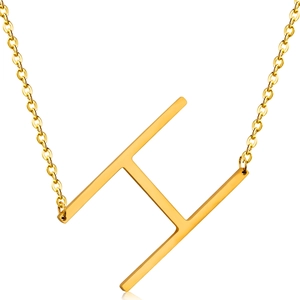 Macro detail of gold-plated 18K stainless steel H letter pendant and textured link chain