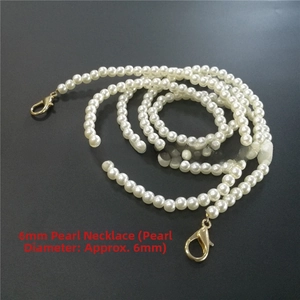 Detailed view of 6mm white pearl chain with gold lobster clasps for bags and phones