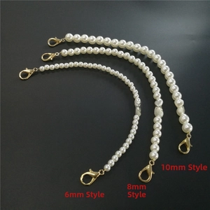 Three sizes of white pearl chains with gold clasps in 6mm, 8mm, and 10mm diameters