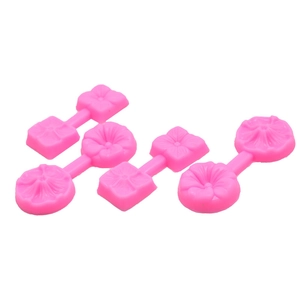 Pink DIY flower plunger cutters for fondant cake decoration and baking crafts