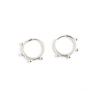 Minimalist S925 sterling silver hoop earrings with small beads on a white background