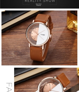 Detailed view of translucent minimalist dial and brown leather strap on luxury watch