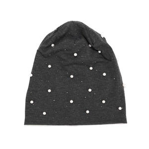 Close-up of charcoal grey beanie featuring sparkling rhinestones and white pearls