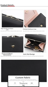 Detail of black PU leather wallet showing pink interior, coin slot and heart metal clasp