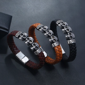 Vintage men's woven leather skull bracelets in black and brown with metal buckles